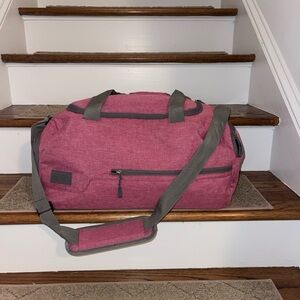 Stylish Women's Pink Duffel Bag with Gray Straps